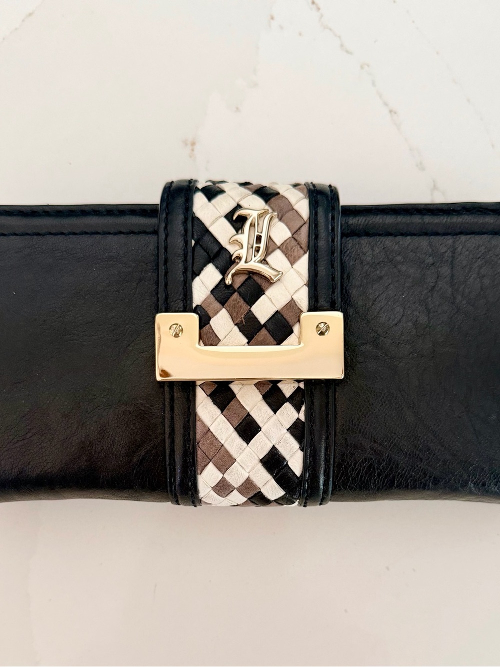 L.A.M.B. Black Leather Clutch with Woven Black, White, and Taupe Accent
